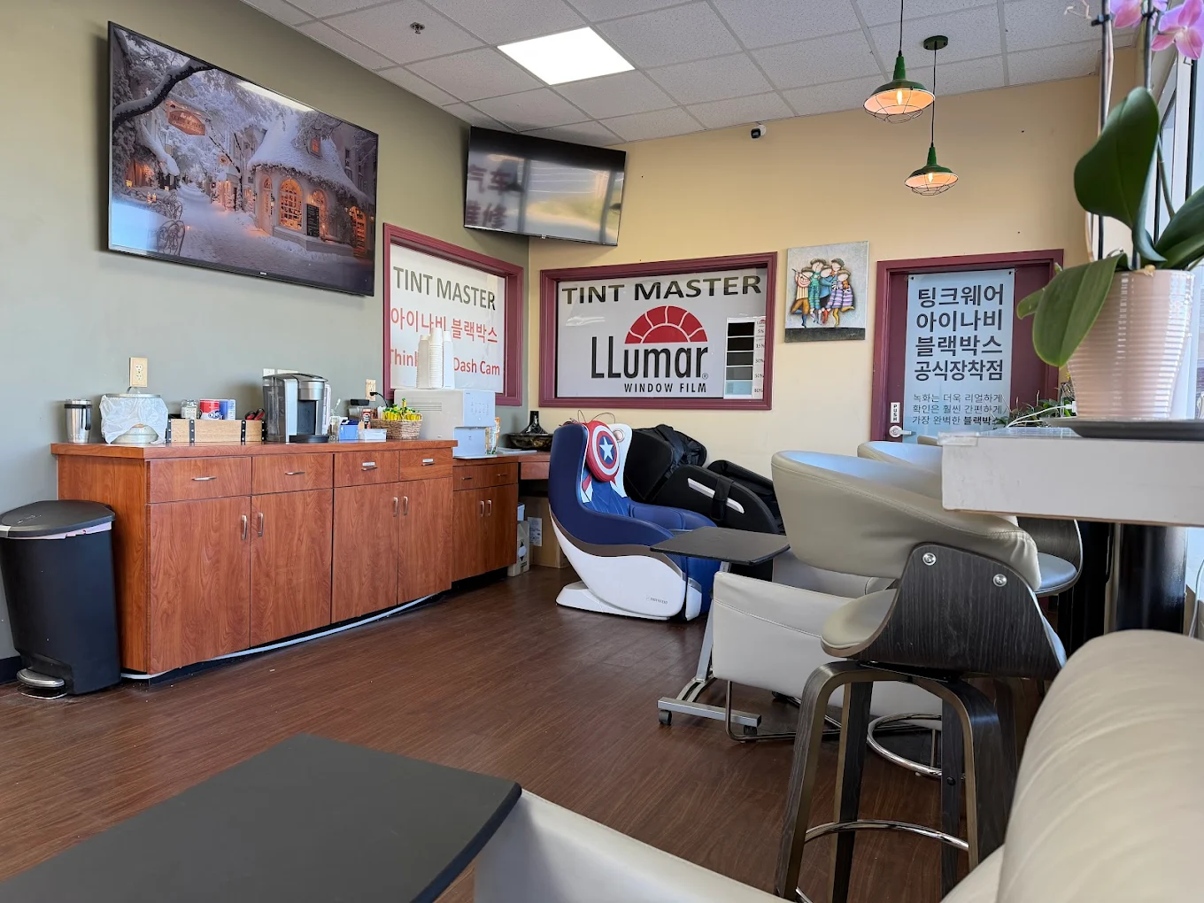 Grand Tires garage bay with cars on lifts